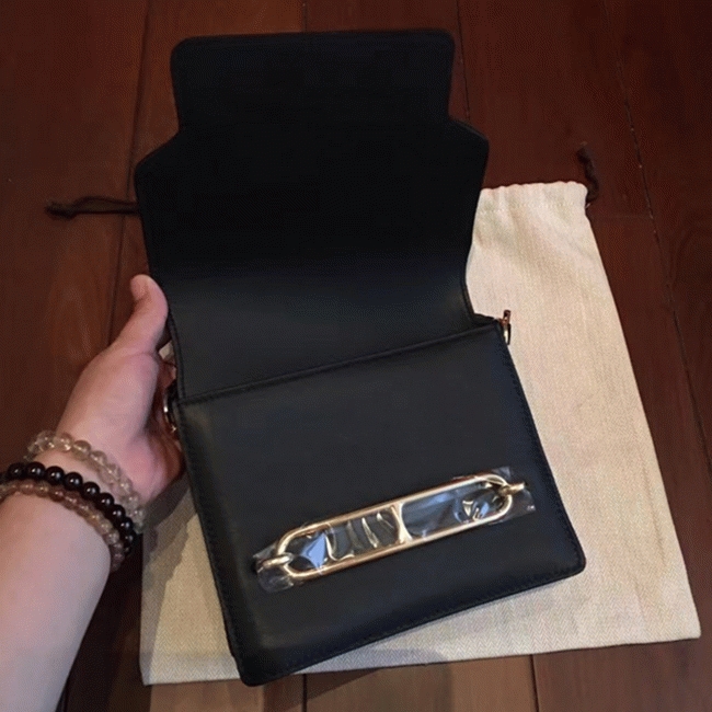 Black knockoff Hermes Mini Sac Roulis handbag