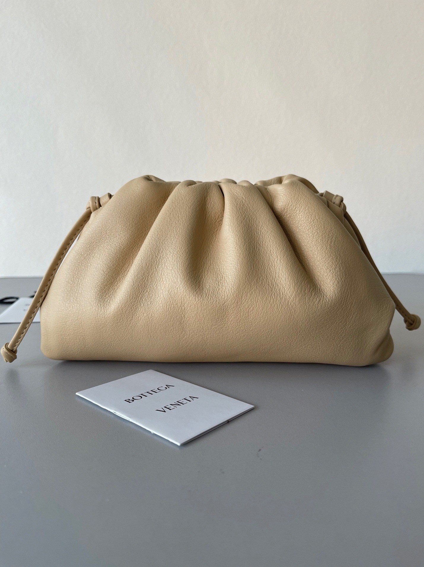 Fake Bottega Veneta Mini Pouch with Strap Almond