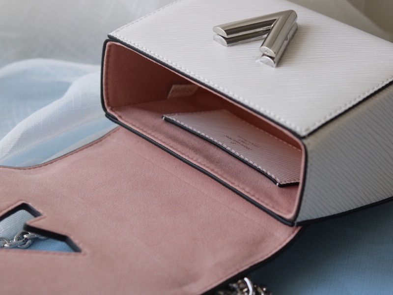 Louis Vuitton Epi Leather Twist Mini Bag In Off-White