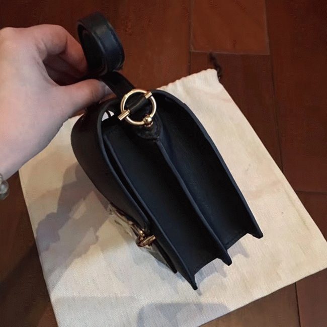 Black knockoff Hermes Mini Sac Roulis handbag