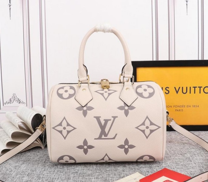 Louis Vuitton Bicolor Monogram Empreinte Leather Speedy Bandouliere 25 Handbag In Cream And Bois De Rose Pink