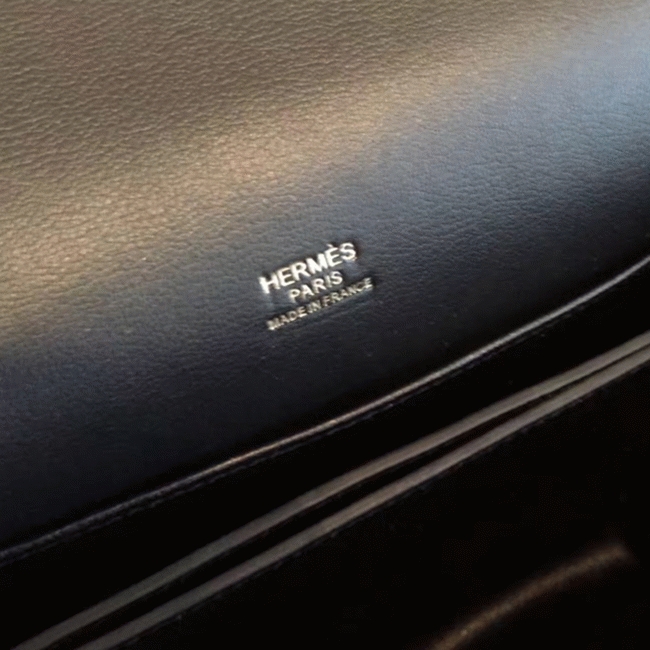Black knockoff Hermes Mini Sac Roulis handbag