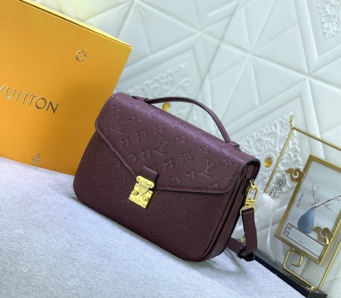 LV Monogram Empreinte Leather Metis In Wine