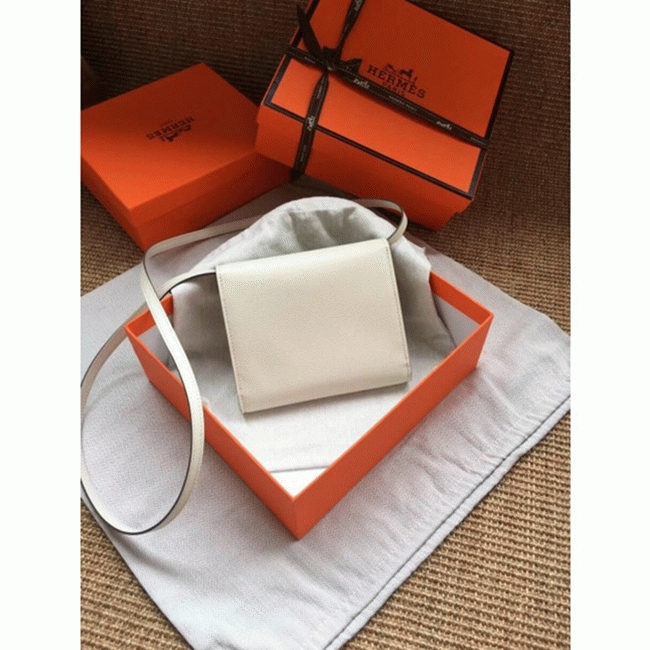 White top knockoff Hermes Clic wallet with strap