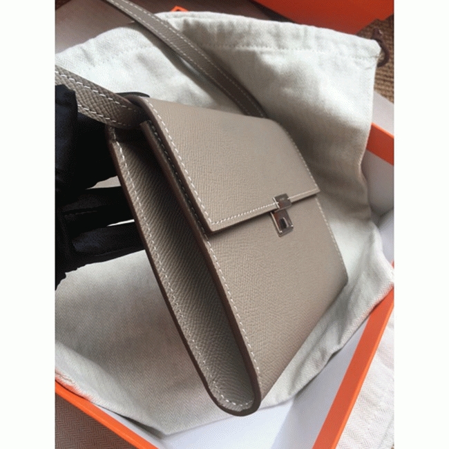 Grey 1:1 replica Hermes Clic wallet with strap