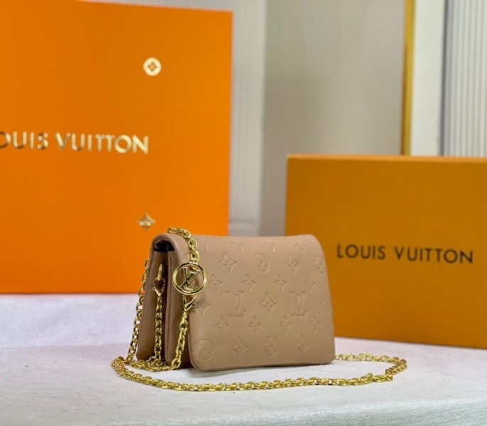 Louis Vuitton Coussin Pochette In Camel