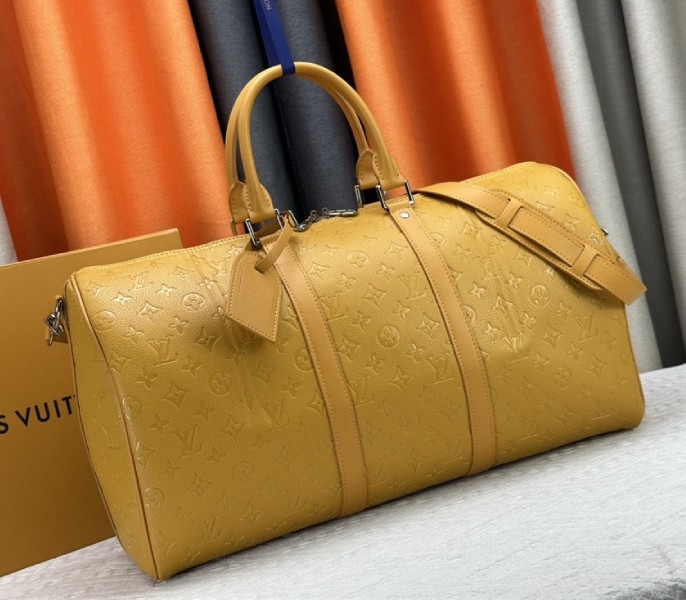 Louis Vuitton Taurillon Leather Keepall Bandouliere 50 In Safran Yellow