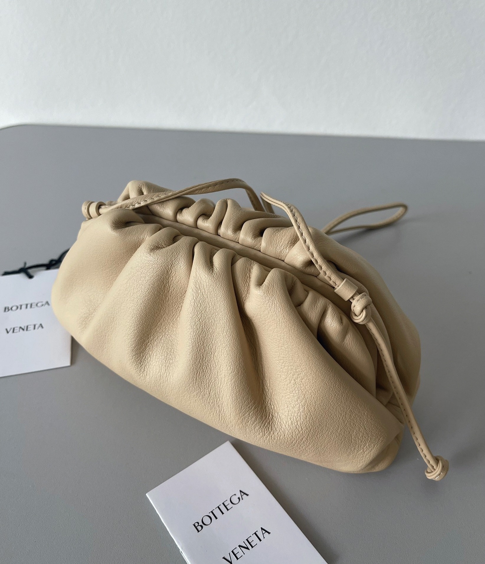 Fake Bottega Veneta Mini Pouch with Strap Almond