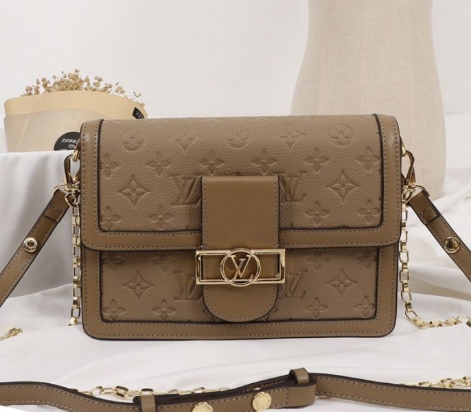Louis Vuitton Monogram Empreinte Dauphine Bag In Brown