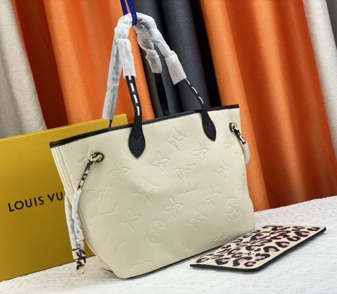Louis Vuitton Monogram Empreinte Wild At Heart Neverfull MM Tote In Cream