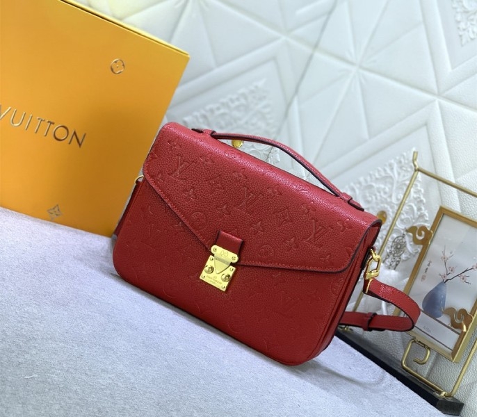 LV Monogram Empreinte Leather Metis In Red