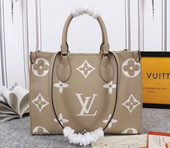 Louis Vuitton Monogram Empreinte OnTheGo MM Tote In Tourterelle Gray