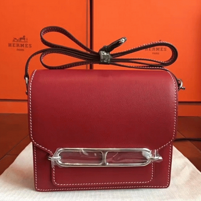 Red designer replica Hermes Mini Sac Roulis handbag