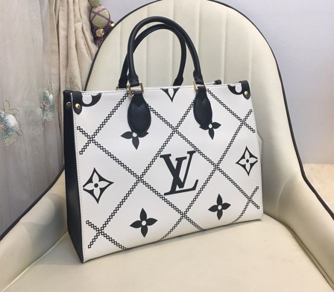 Louis Vuitton Spring 2022 Monogram Empreinte Onthego MM Tote In Cream
