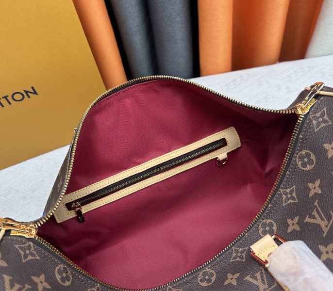 LV X TM Monogram Canvas Keepall Bandouliere 45