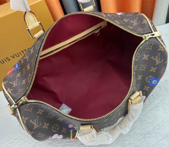 LV X TM Monogram Canvas Keepall Bandouliere 45