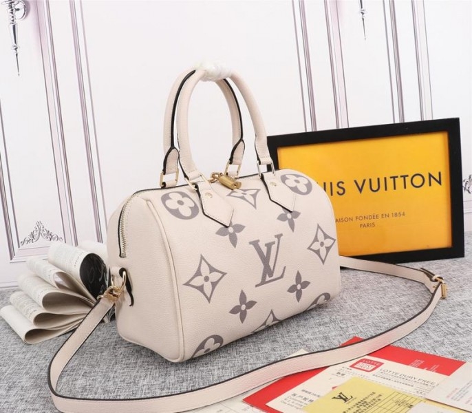 Louis Vuitton Bicolor Monogram Empreinte Leather Speedy Bandouliere 25 Handbag In Cream And Bois De Rose Pink