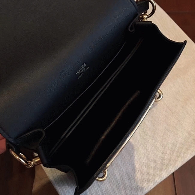 Black knockoff Hermes Mini Sac Roulis handbag