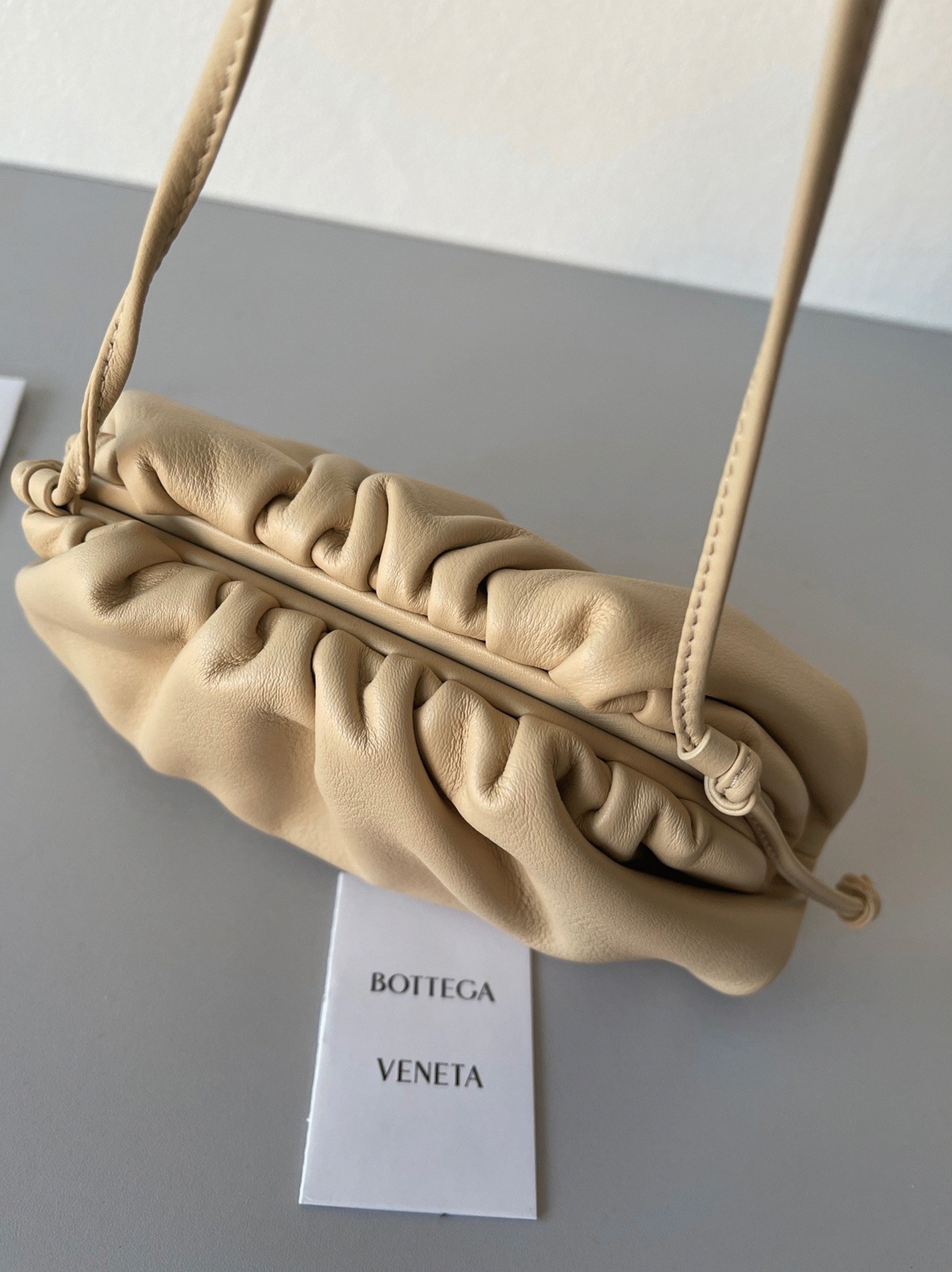 Fake Bottega Veneta Mini Pouch with Strap Almond