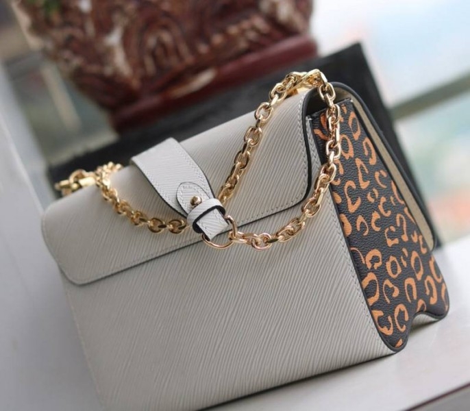 Louis Vuitton Epi Leather Jungle Edition Twist MM Bag In Optic White