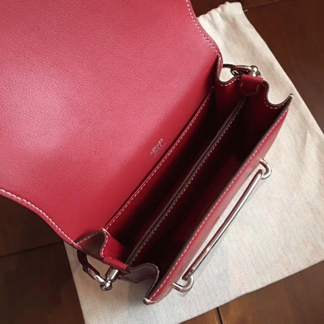 Red designer replica Hermes Mini Sac Roulis handbag