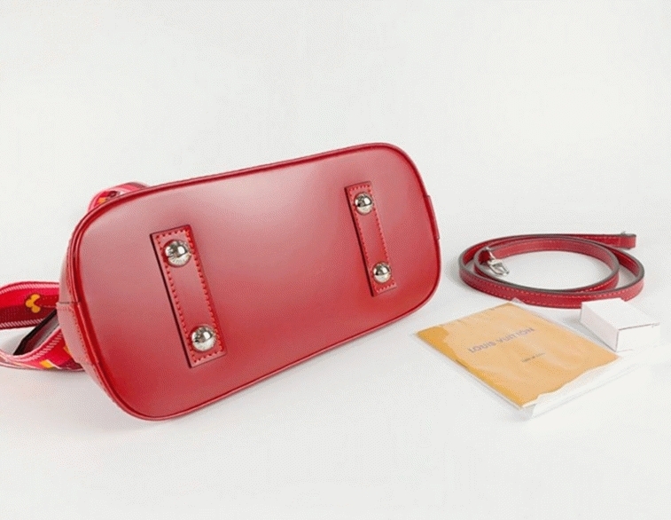 Louis Vuitton Epi Leather Alma BB Handbag In Red With Jacquard Strap