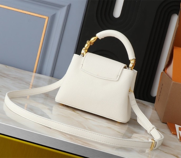 Louis Vuitton Capucines Mini Capucines Handbag In Quartz White