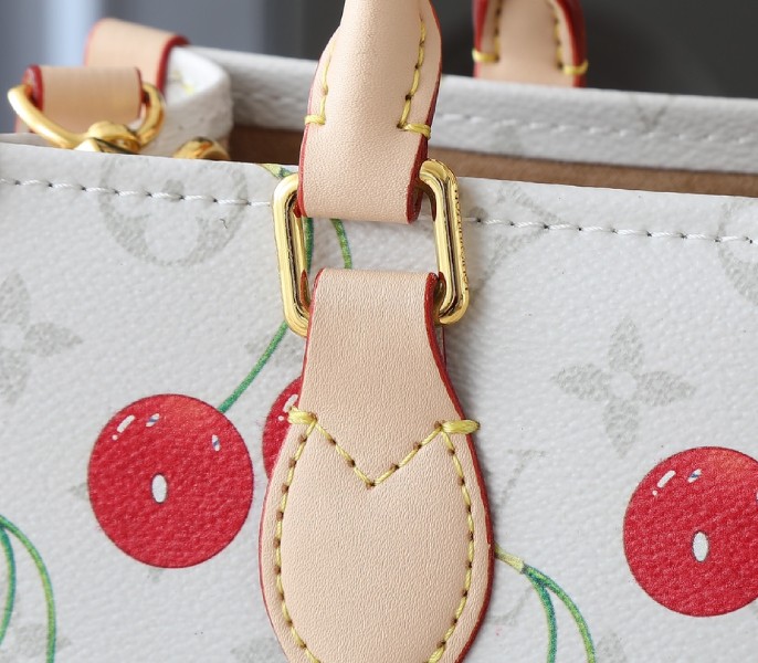 LV X TM Monogram Cherry Canvas Onthego PM In White