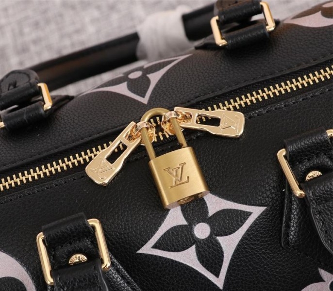Louis Vuitton Bicolor Monogram Empreinte Leather Speedy Bandouliere 25 Handbag In Black And Lilac