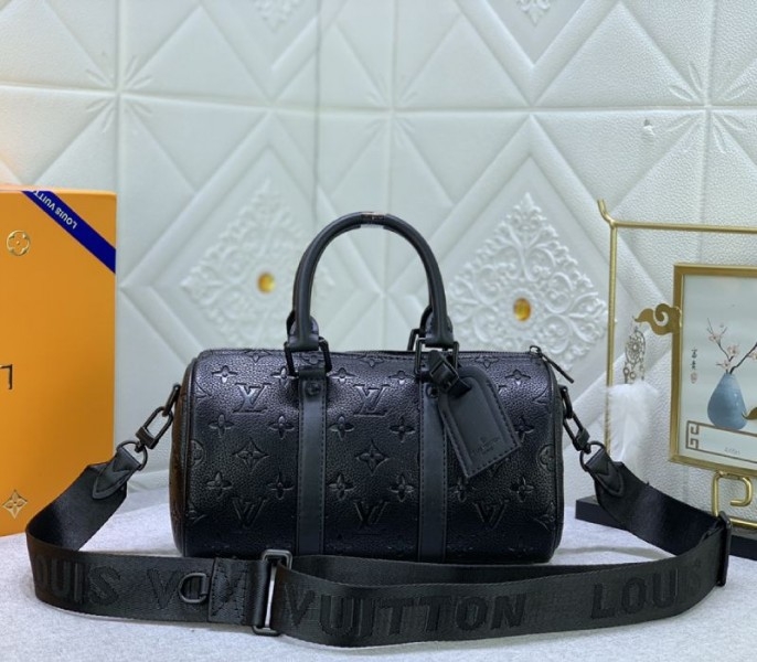 Louis Vuitton Taurillon Monogram Leather Keepall Bandouliere 25 In Black