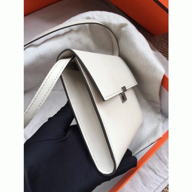 White top knockoff Hermes Clic wallet with strap