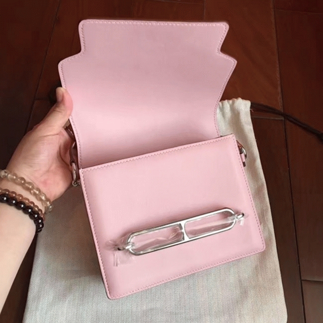 Rose dragee replica Hermes Mini Sac Roulis handbag
