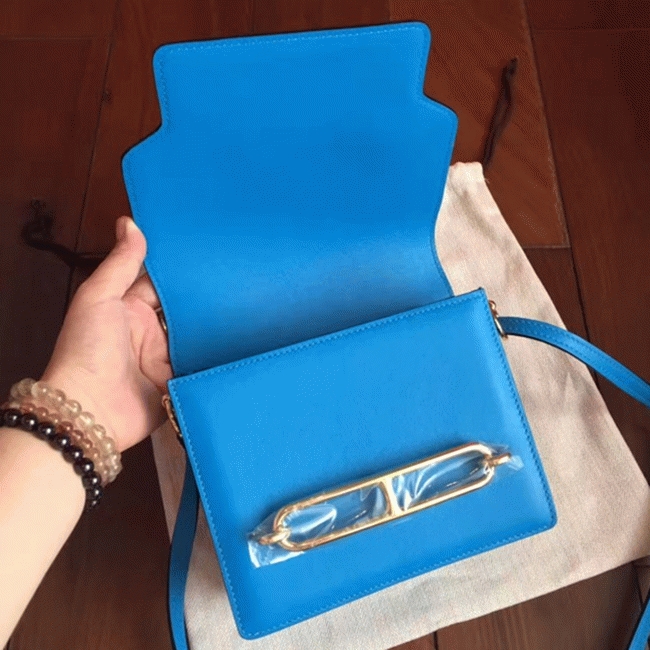 Blue hydra luxury replica Hermes Mini Sac Roulis handbag