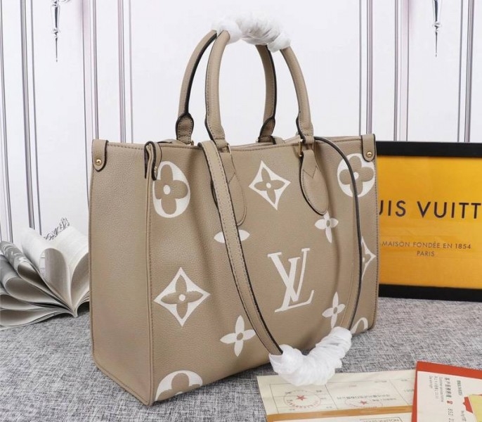 Louis Vuitton Monogram Empreinte OnTheGo MM Tote In Tourterelle Gray