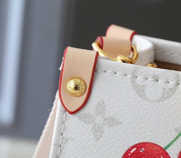LV X TM Monogram Cherry Canvas Onthego PM In White