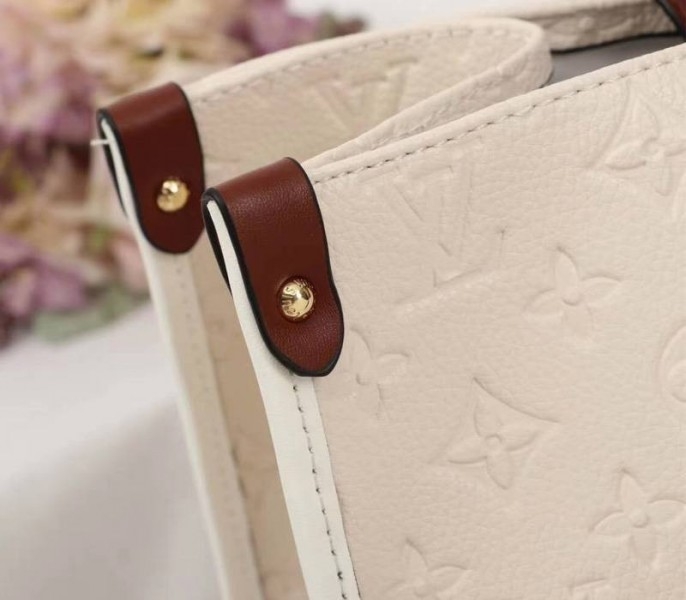 Louis Vuitton Monogram Empreinte Onthego GM Tote In Cream