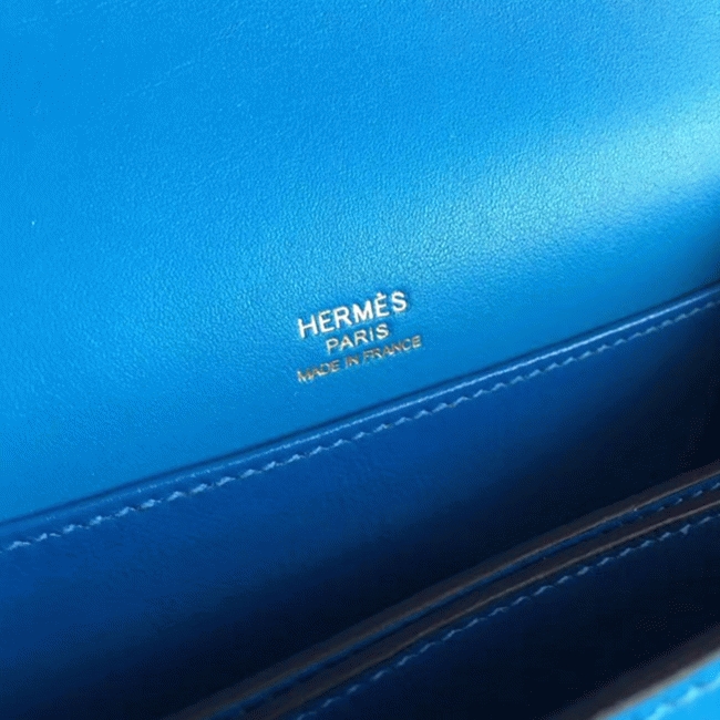 Blue hydra luxury replica Hermes Mini Sac Roulis handbag