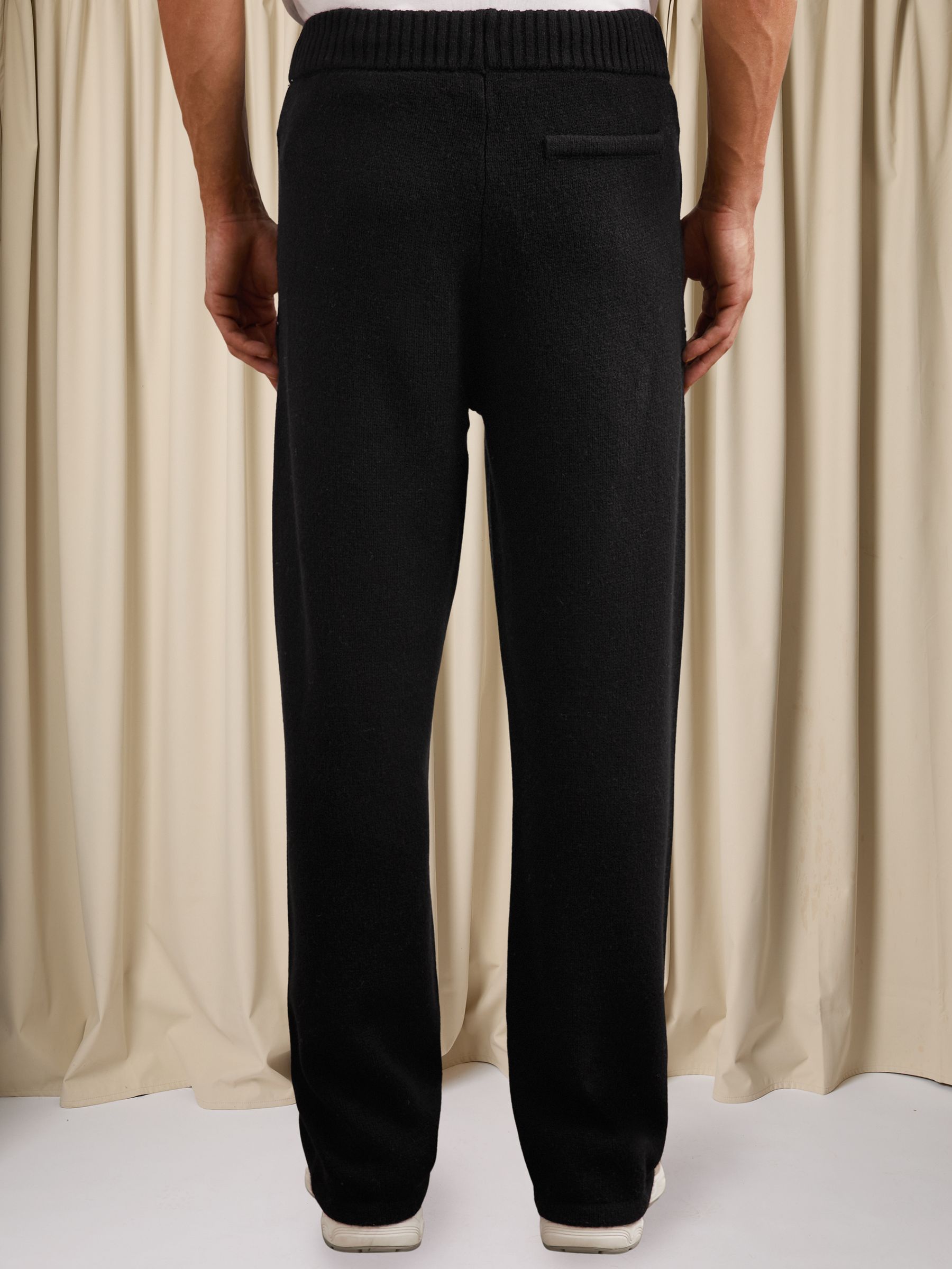 Monogram Wool Wide-Leg Knitted Joggers in Black