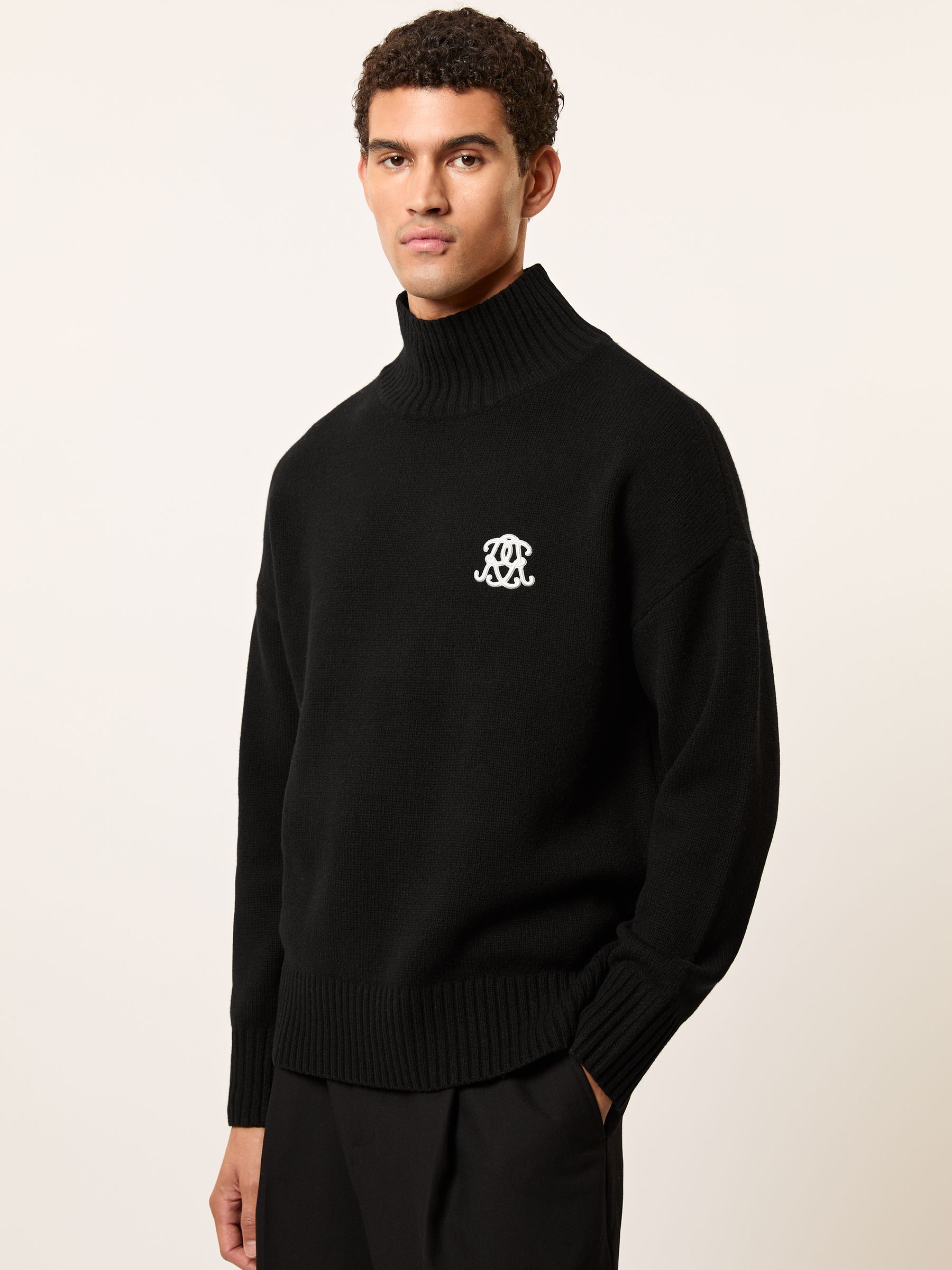 Monogram Wool Relaxed Jumper in Black
