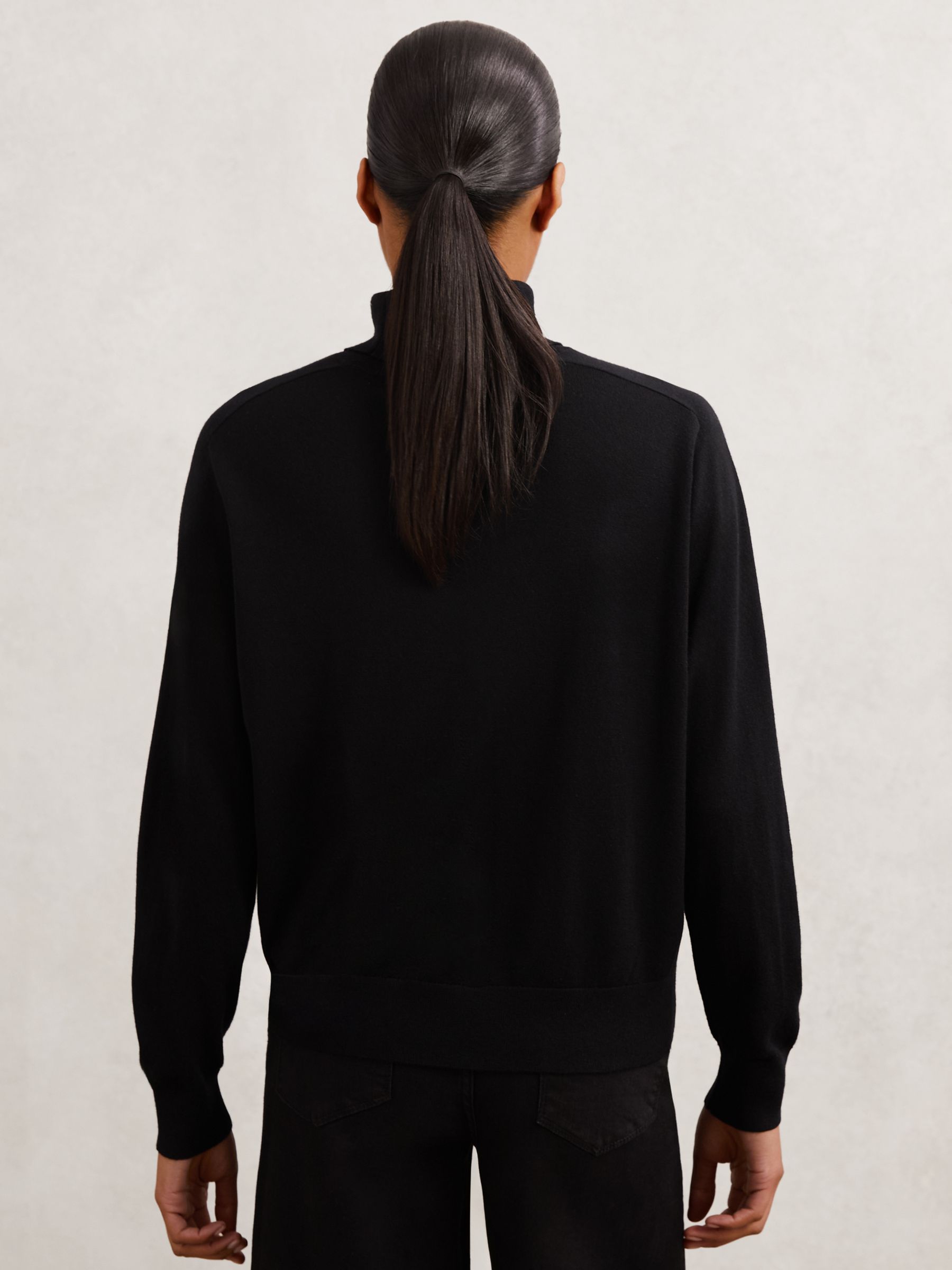 Wool Roll-Neck Jumper in Black