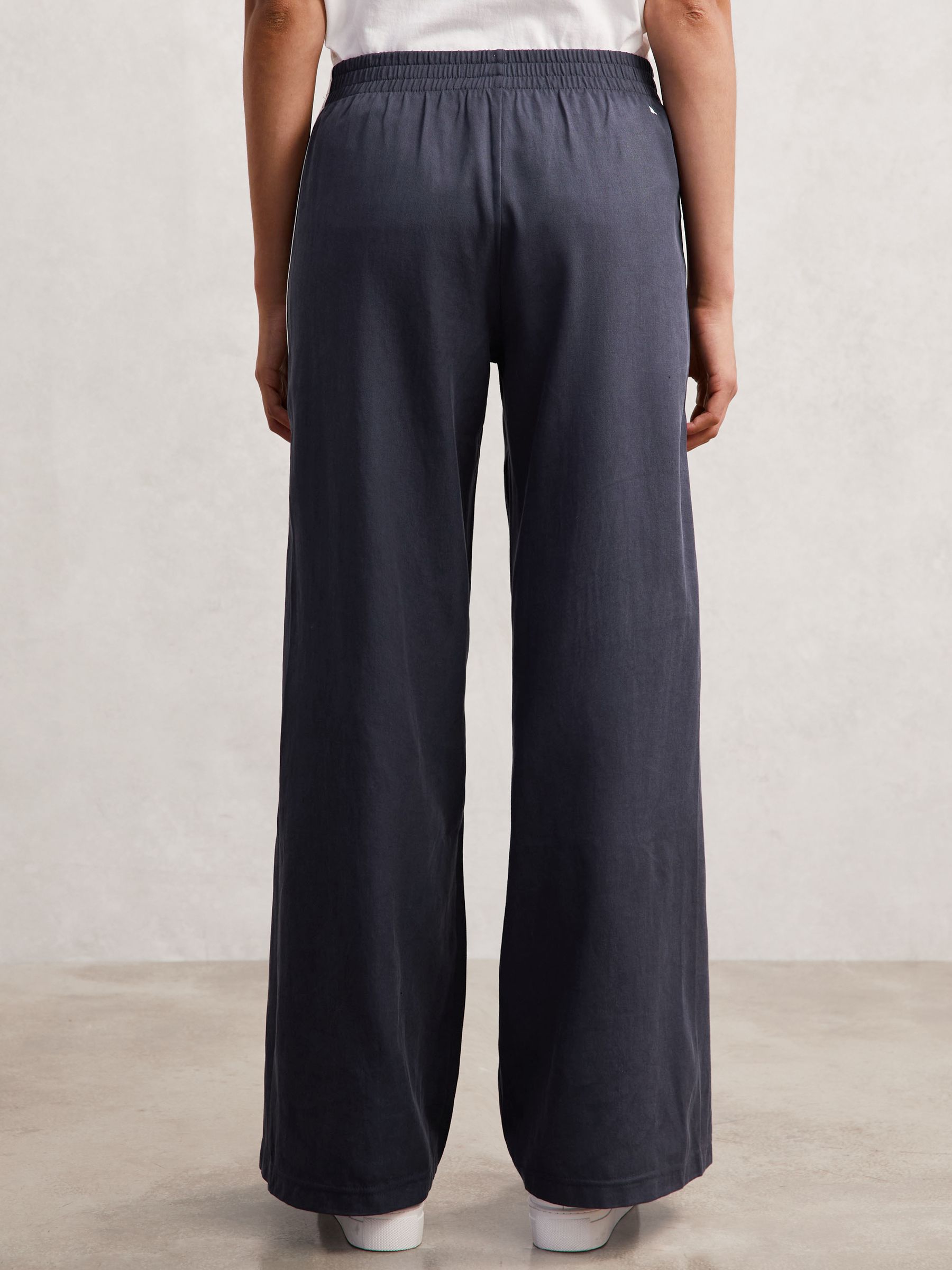 The Upside Side-Stripe Jersey Joggers in Navy