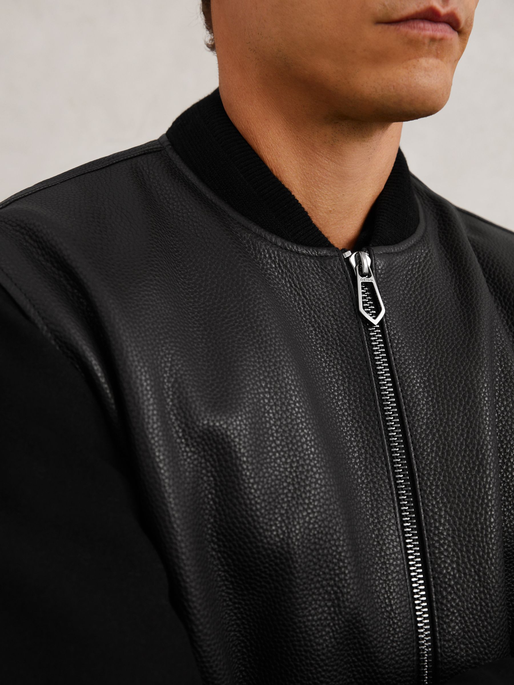 Leather Contrast-Sleeve Bomber Jacket in Black
