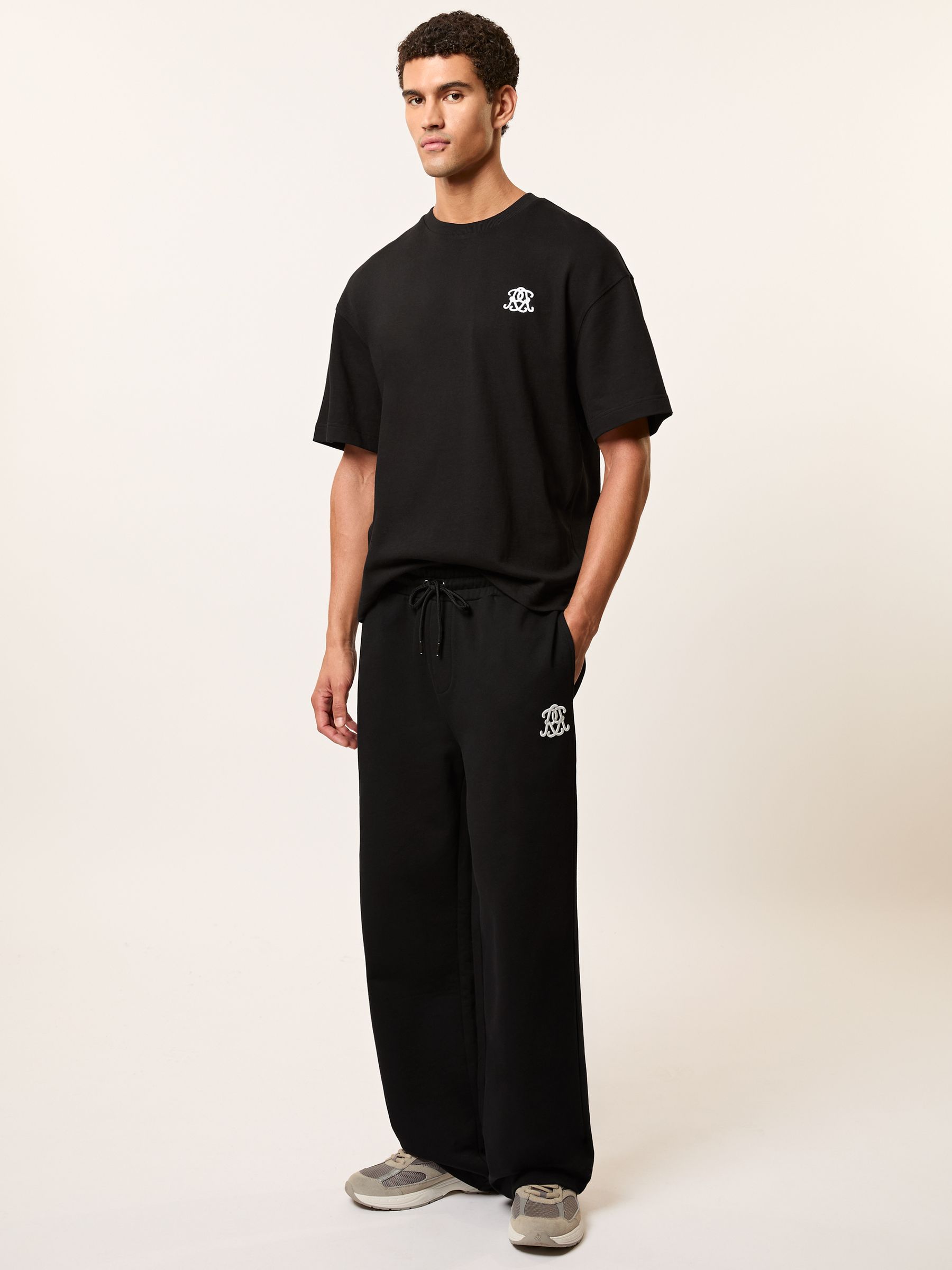 Monogram Cotton Wide-Leg Joggers in Black