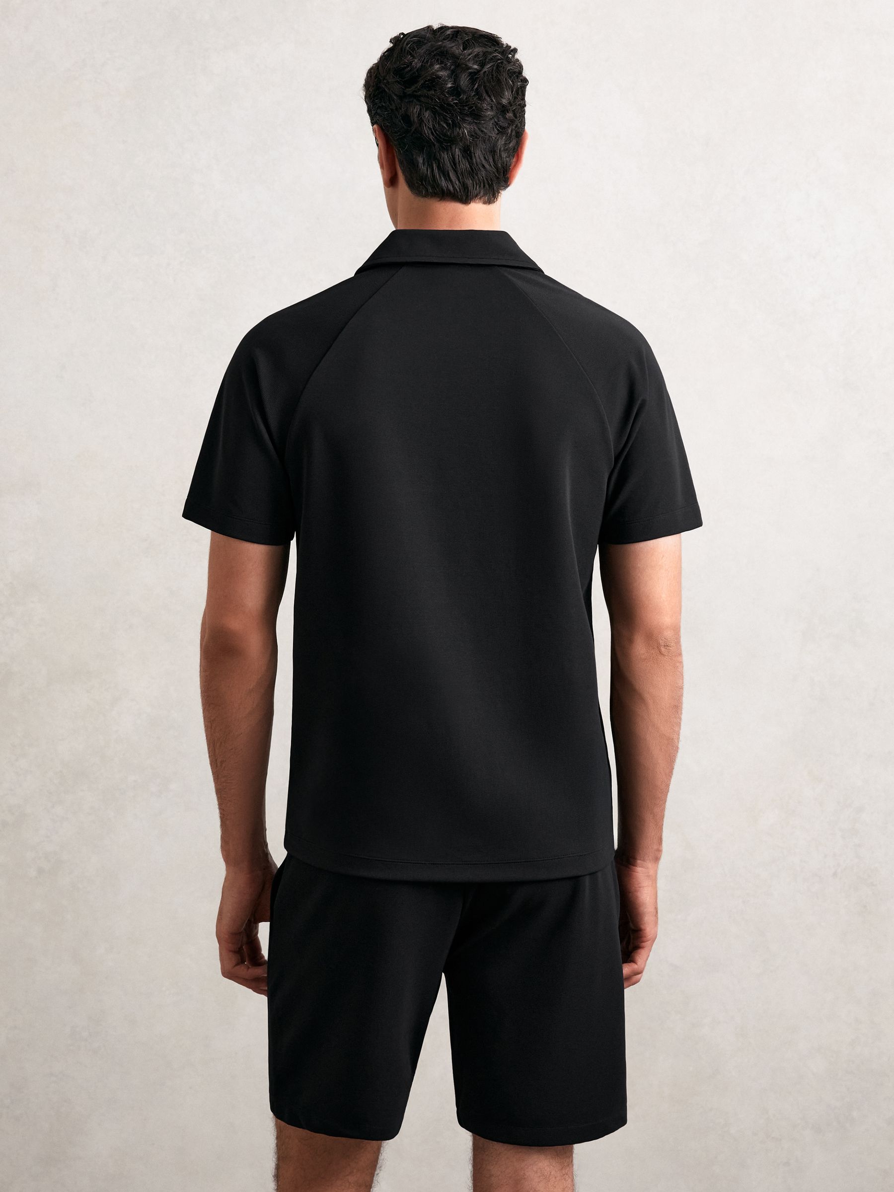 Textured Raglan Half-Zip Polo Shirt in Black