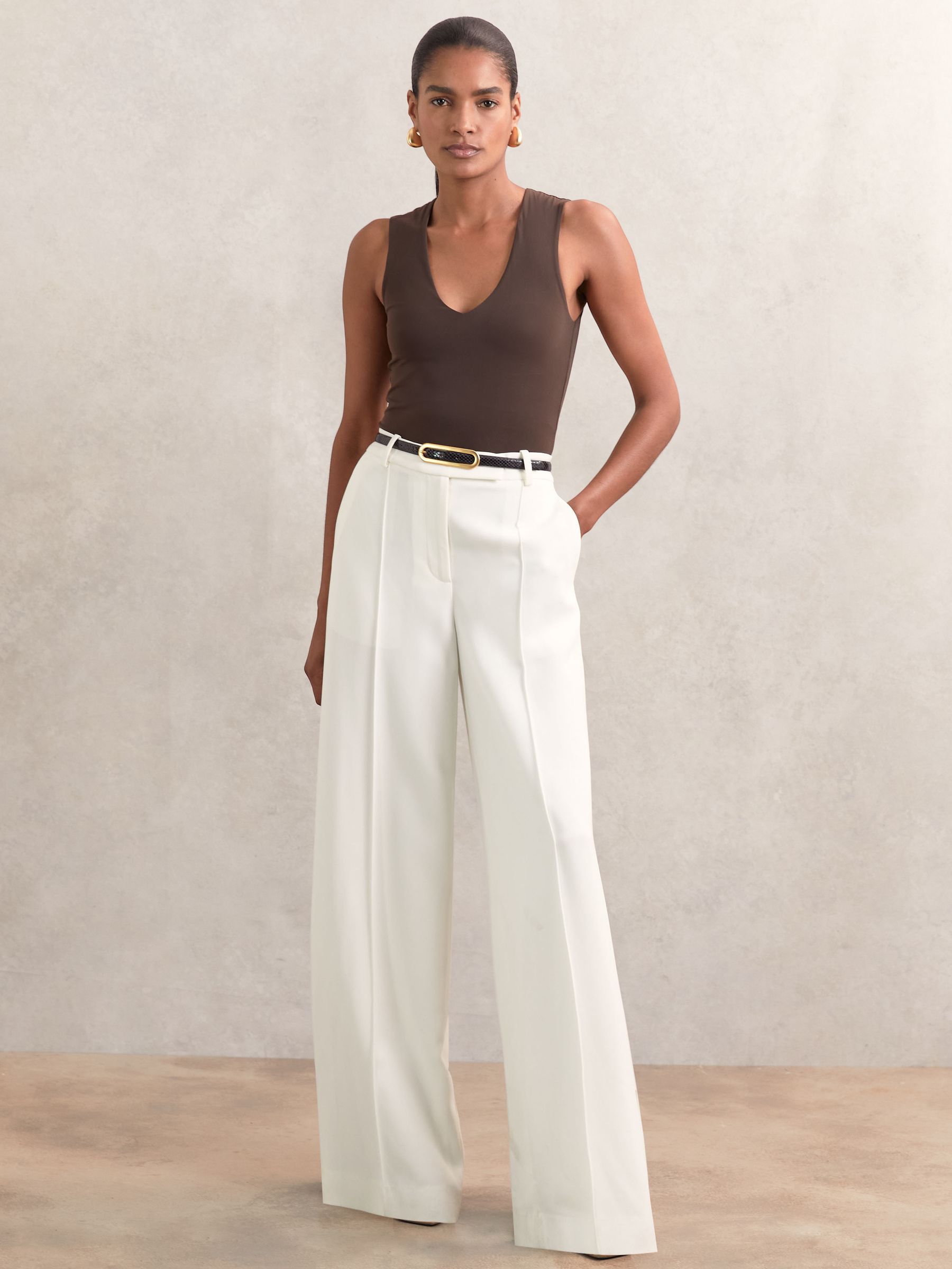 Thin Leather Elongated Buckle Belt in Black Snakeskin