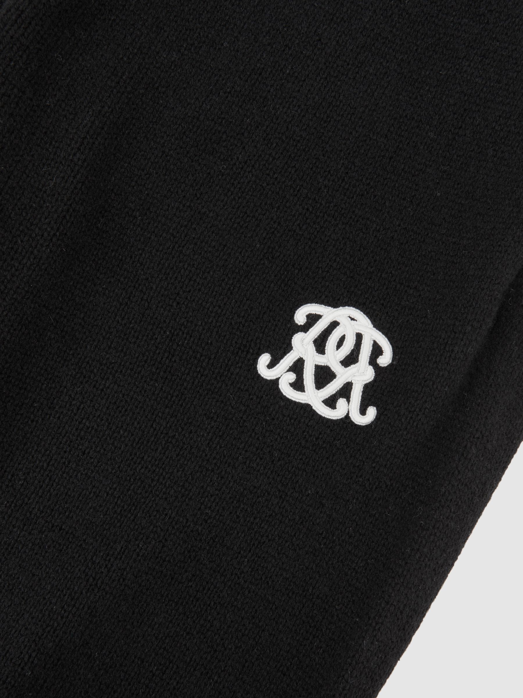 Monogram Wool Wide-Leg Knitted Joggers in Black