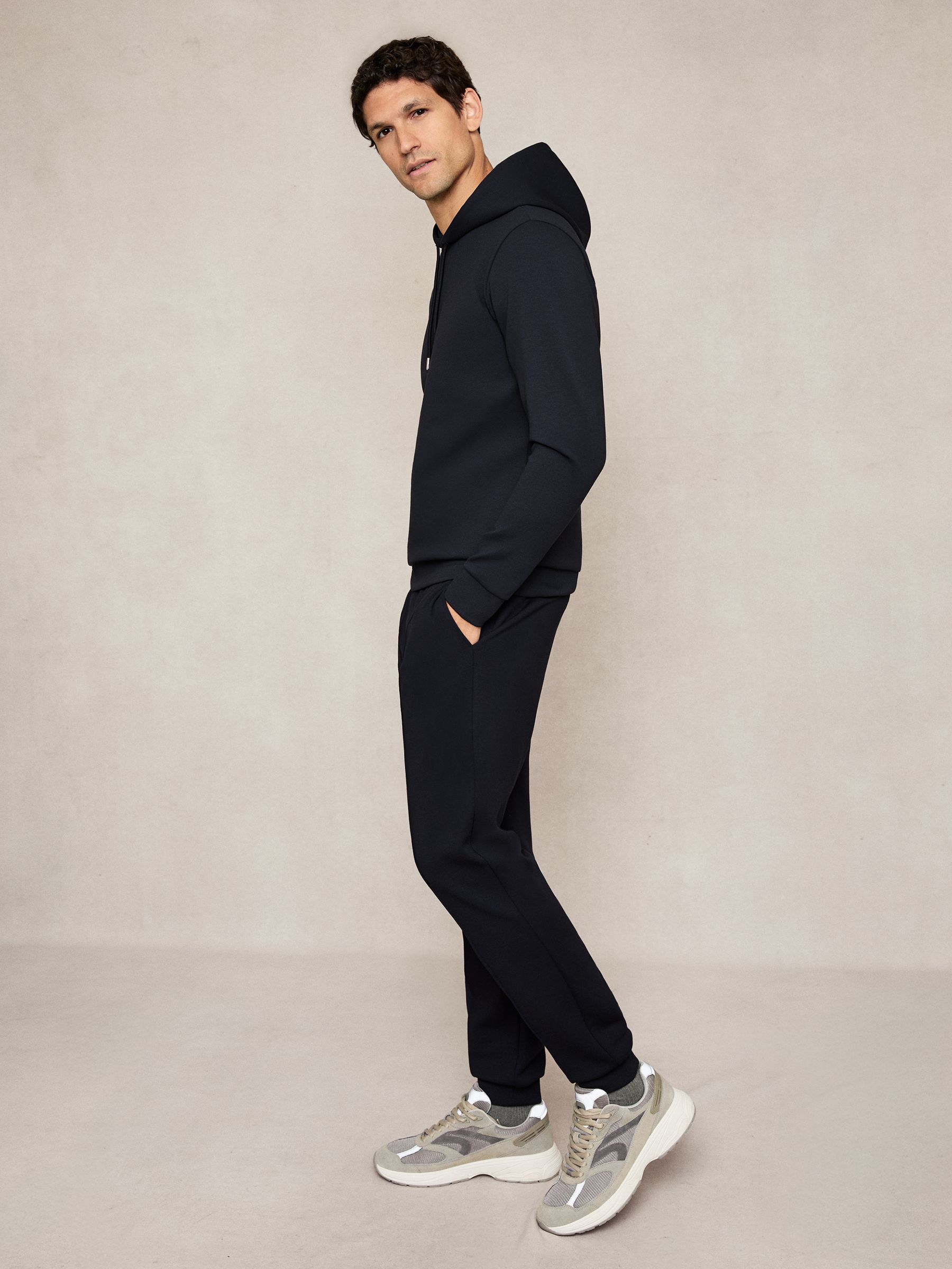 Interlock Jersey Drawstring Hoodie in Navy Blue