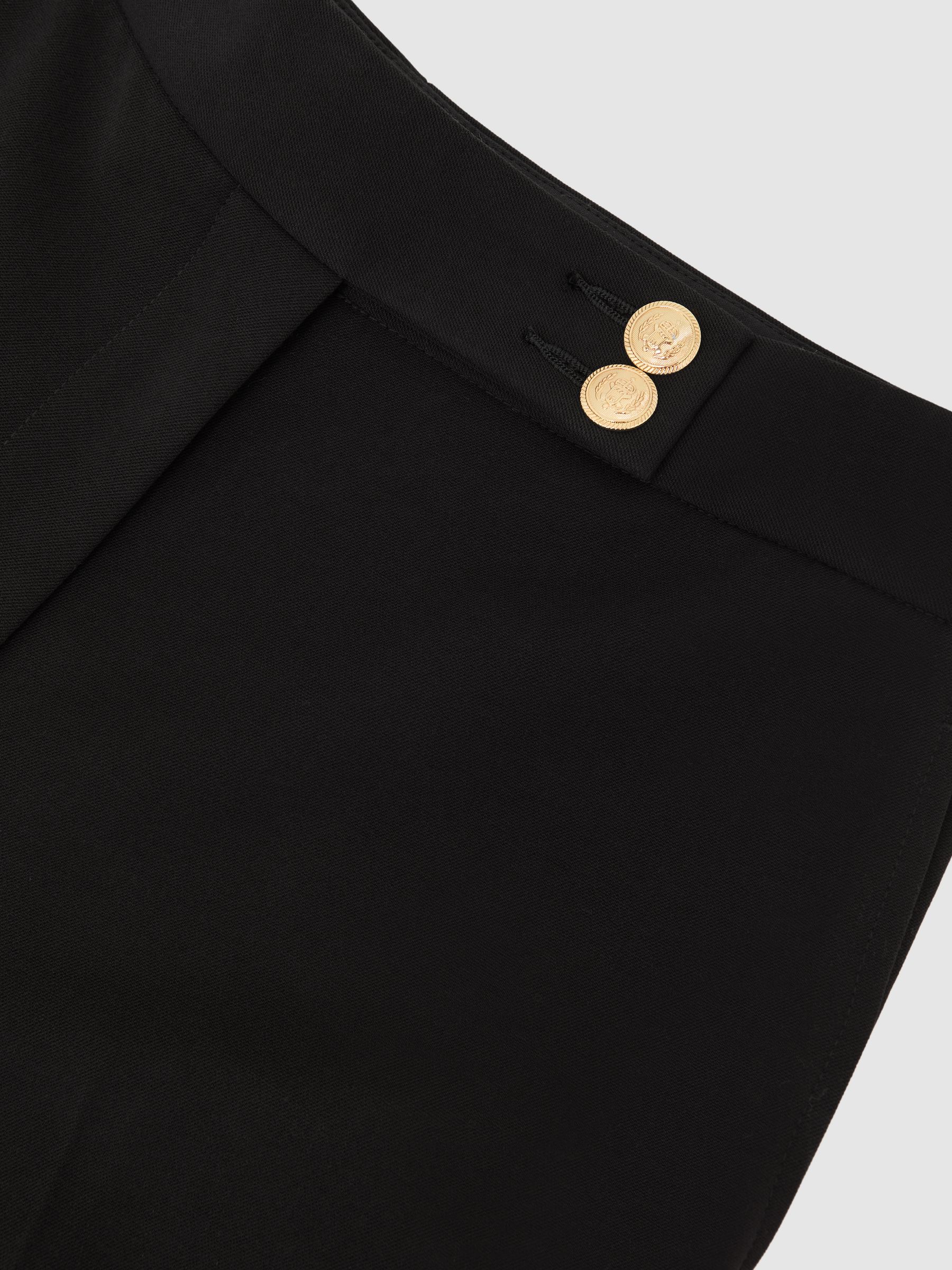 Tapered Button-Detail Trousers in Black