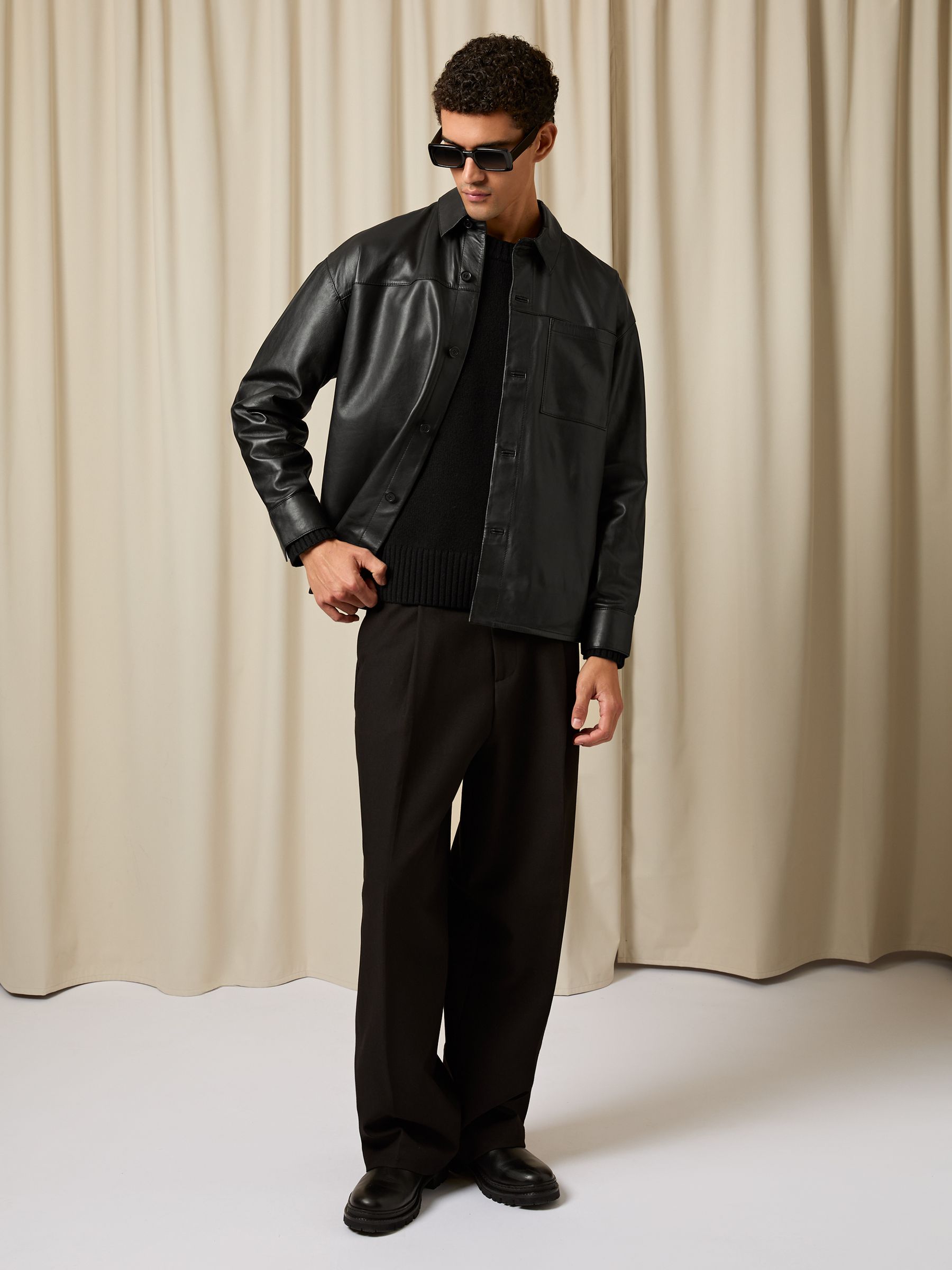 Monogram Embossed Leather Jacket in Black