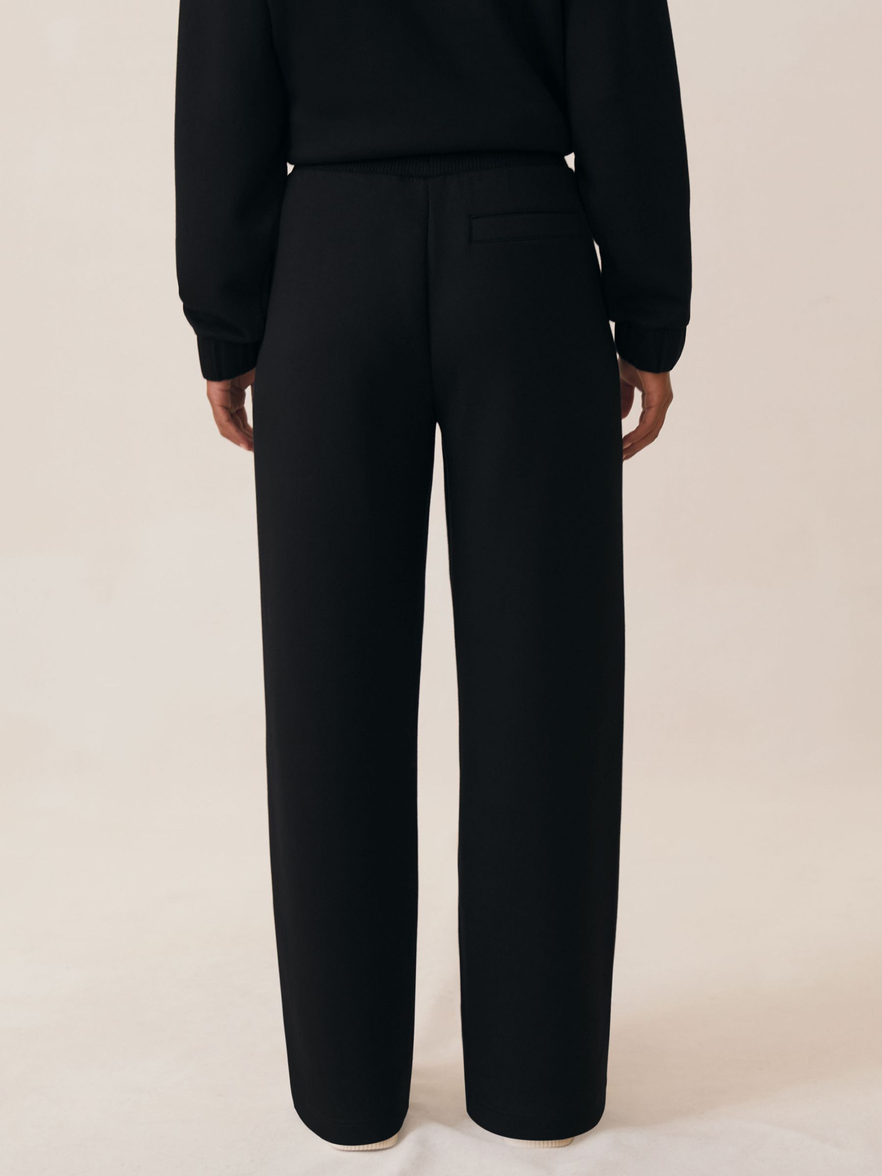 Wide-Leg Interlock Drawstring Joggers in Black